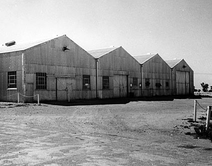Historical Australian government photograph of workshop buildings at the Maralinga atomic test site, c. July 1955.